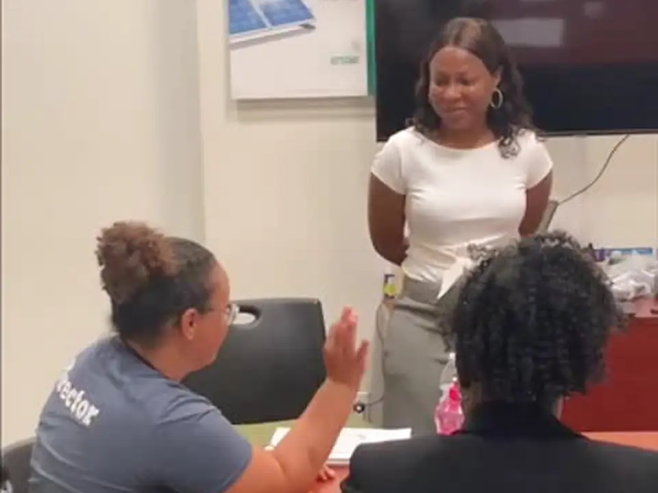 Angela Finley listening as a workshop participant contributes to the discussion